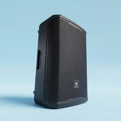 Black speaker with JBL logo on a light blue background