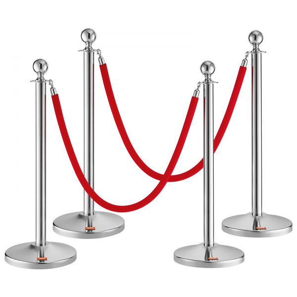 A set of silver stanchion posts with red velvet ropes arranged to form a barrier