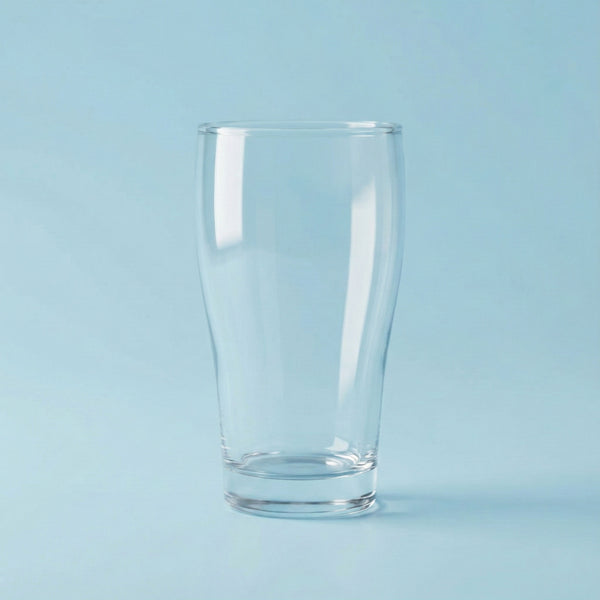 Clear beer pot glass on a light blue background