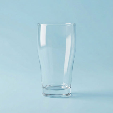 Clear beer pot glass on a light blue background