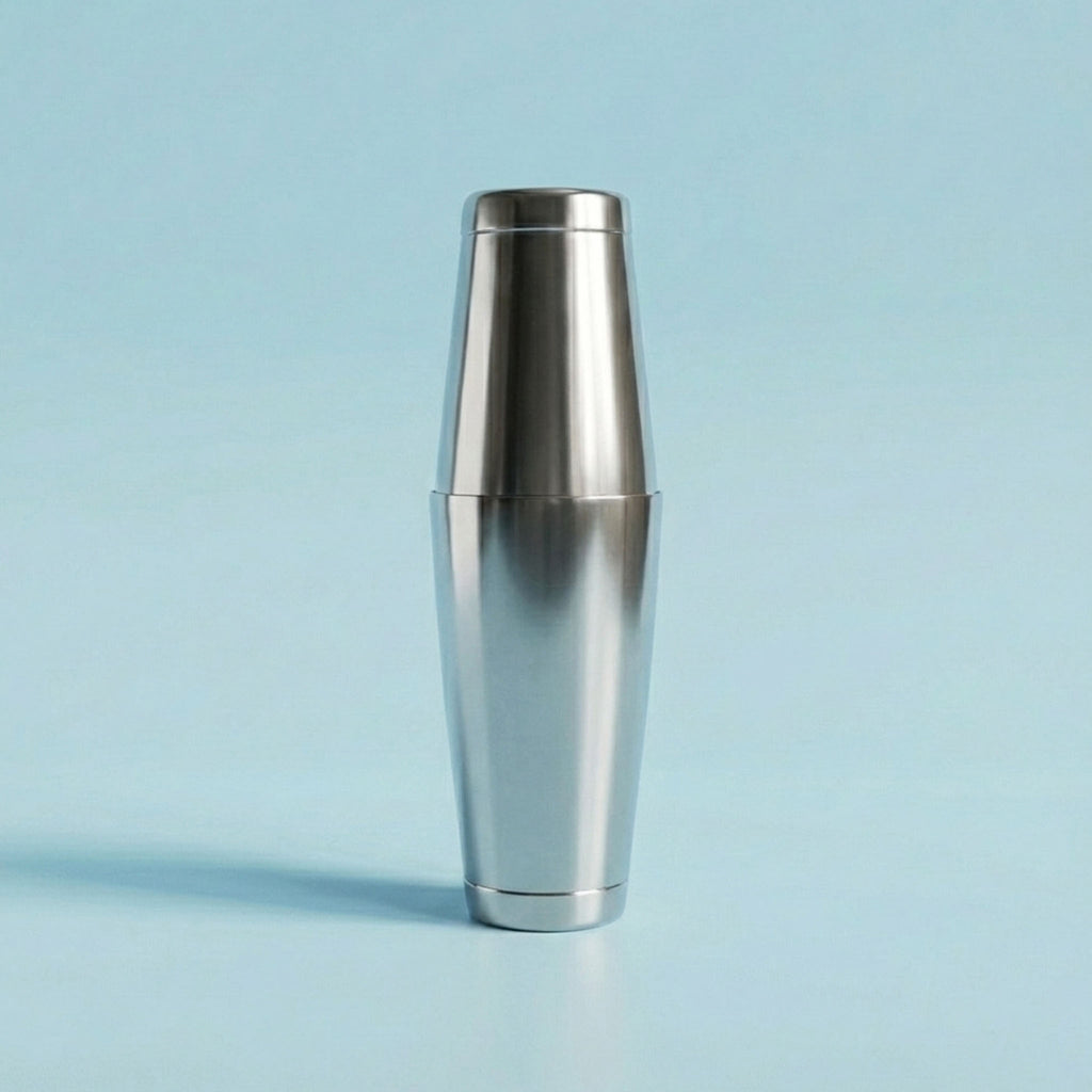 Silver shaker on a light blue background